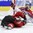 PLYMOUTH, MICHIGAN - APRIL 7: Czech Republic and Switzerland player get tangled up during relegation round action at the 2017 IIHF Ice Hockey Women's World Championship. (Photo by Matt Zambonin/HHOF-IIHF Images)

